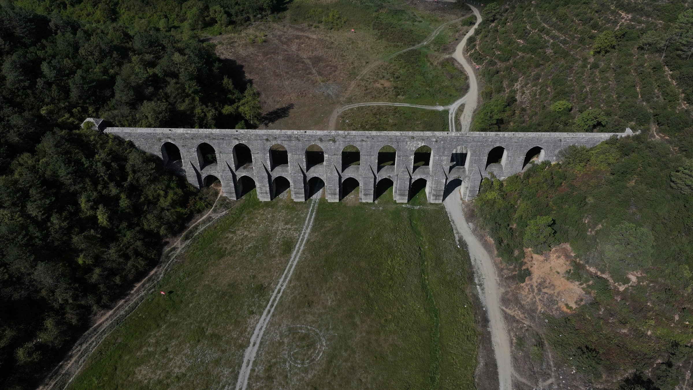 The ancient aqueduct crossing Alibey Dam&#039;s reservoir sits on dry land, highlighting the severe water shortage, Istanbul, Türkiye, Sept. 26, 2025. (AA Photo)