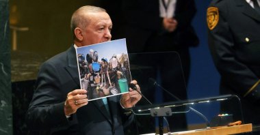 Holding a picture from Gaza, President Recep Tayyip Erdoğan delivers a speech on Israel&#039;s war in Gaza, during the 80th session of the U.N. General Assembly, New York City, U.S., Sept. 23, 2025. (AFP Photo)
