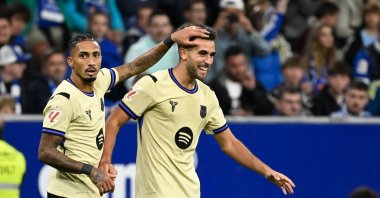 Barcelona&#039;s Eric Garcia (R) celebrates with teammate Raphinha after scoring their first goal during the La Liga match against Real Oviedo at the Carlos Tartiere stadium, Oviedo, Spain, Sept. 25, 2025. (AFP Photo)