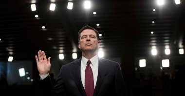 Ousted FBI director James Comey is sworn in during a hearing before the Senate Select Committee on Intelligence on Capitol Hill, Washington, U.S., June 8, 2017. (AFP Photo)
