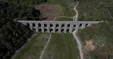 The ancient aqueduct crossing Alibey Dam&#039;s reservoir sits on dry land, highlighting the severe water shortage, Istanbul, Türkiye, Sept. 26, 2025. (AA Photo)