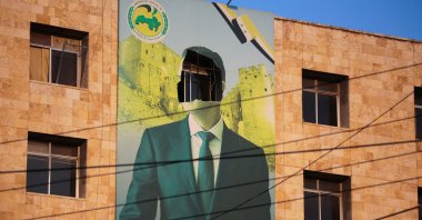 A view shows a damaged poster of Syria&#039;s President Bashar Assad during the anti-regime offensive in Aleppo, Syria Nov. 30, 2024. (Reuters Photo)