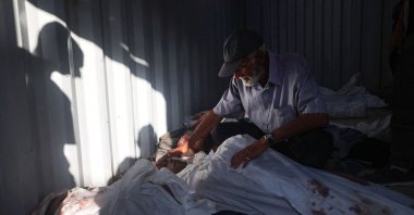 A Palestinian bids farewell to a beloved killed in Israeli bombing, in front of the al-Awda hospital in the Nuseirat refugee camp in the central Gaza Strip, Palestine, Sept. 28, 2025. (AFP Photo)