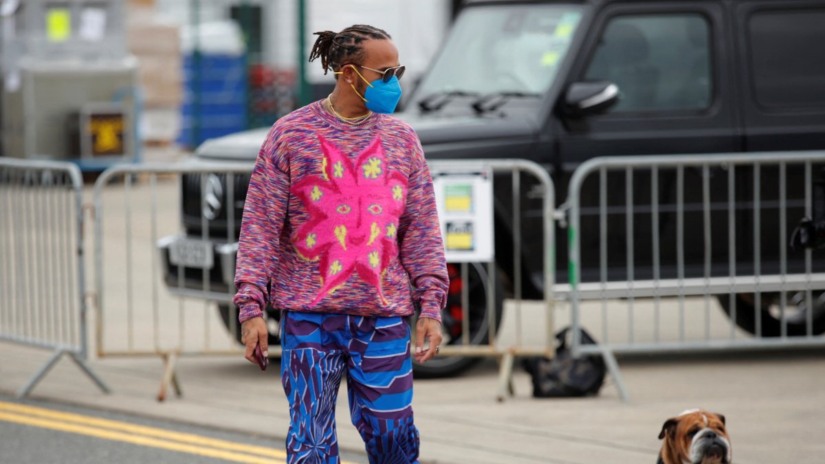 Lewis Hamilton arrives with his dog Roscoe ahead of the British Grand Prix at Silverstone Circuit, Silverstone, U.K., July 15, 2021. (Reuters Photo)
