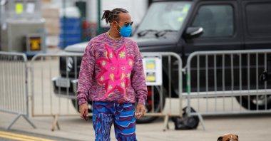 Lewis Hamilton arrives with his dog Roscoe ahead of the British Grand Prix at Silverstone Circuit, Silverstone, U.K., July 15, 2021. (Reuters Photo)