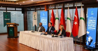 Associate professor Mehmet Dinç, president of Green Crescent (Yeşilay) (C), professor Murat Şentürk, president of Türkiye Yeşilay Science Board (R), and Dr. Merih Altıntaş, Advisory Board Member of Yeşilay, present the gambling report at Yeşilay Center, Istanbul, Türkiye, Sept. 29, 2025. (Courtesy Of Yeşilay)