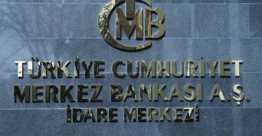 A logo of the Central Bank of the Republic of Türkiye (CBRT) is pictured at the entrance to its headquarters in Ankara, Türkiye, Feb. 8, 2024. (Reuters Photo)