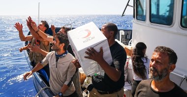 Turkish Red Crescent provides food and medicine to the Global Sumud Flotilla en route to deliver humanitarian aid to Gaza, with Turkish aid reaching the flotilla’s vessels sailing in the Mediterranean between Crete, Cyprus and Egypt, Sept. 29, 2025. (AA Photo)