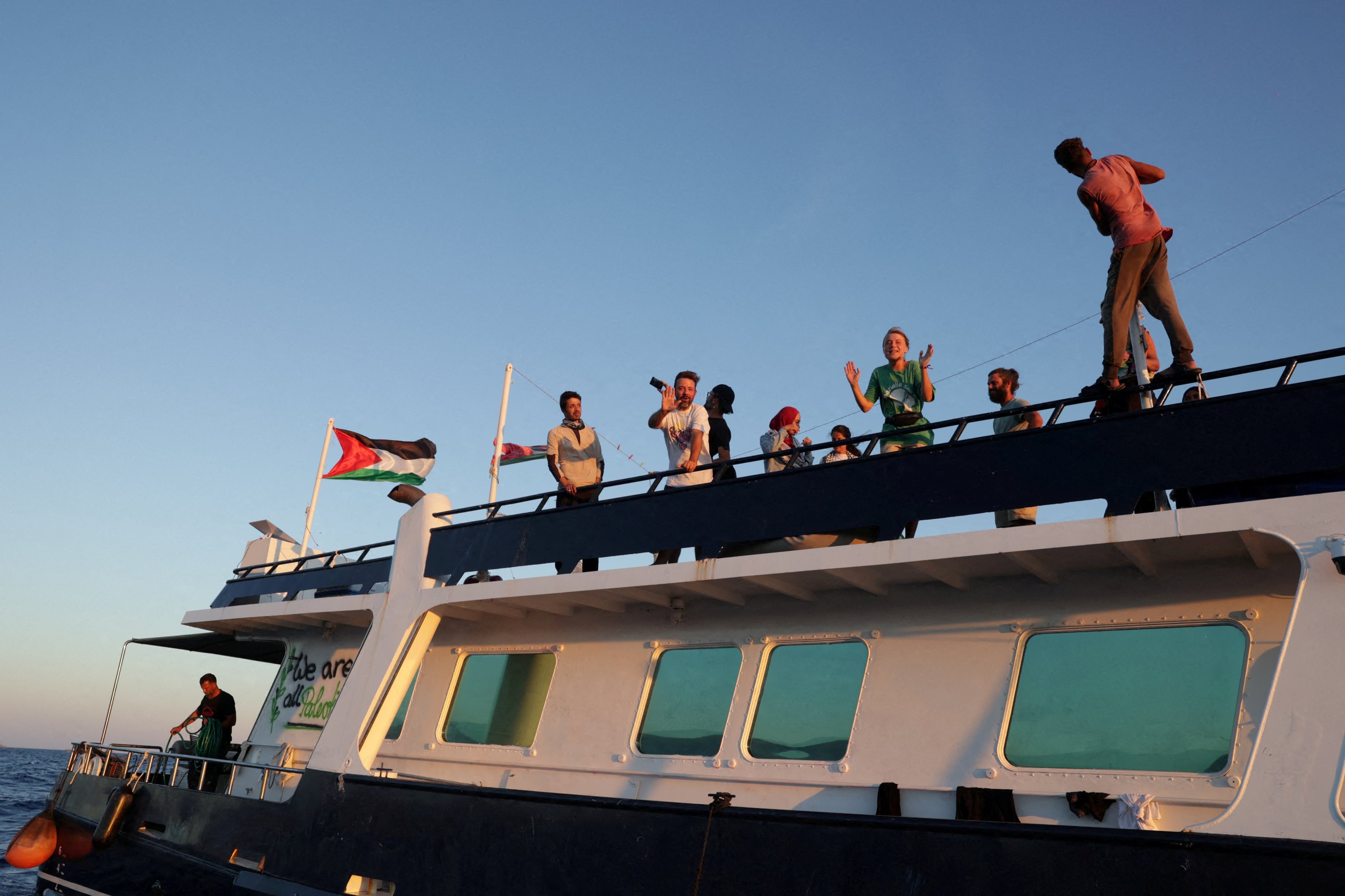 Israeli ships harass Gaza flotilla as it nears besieged territory