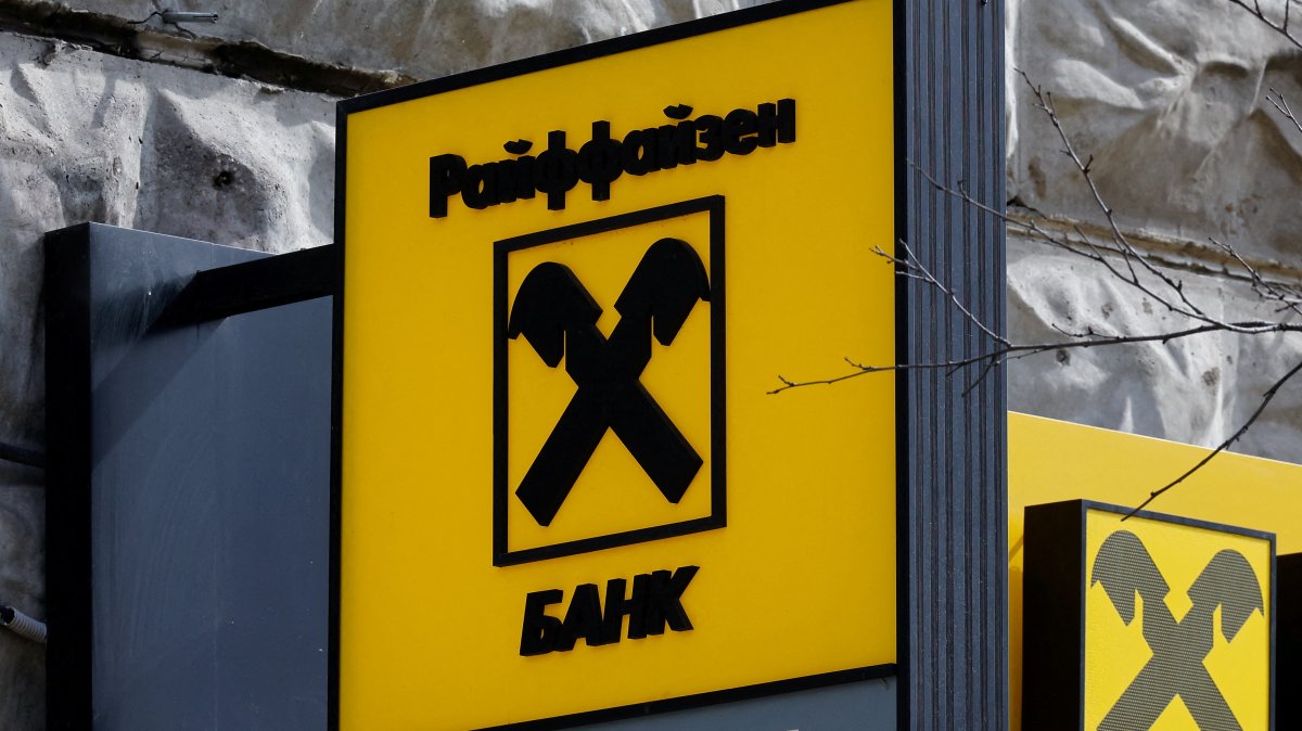 A signboard with the Raiffeisen Bank logo is on display outside a branch, Moscow, Russia, on April 18, 2025. (Reuters Photo)