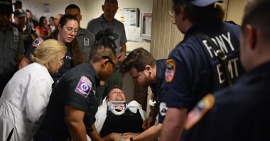Vural Elibol is transferred on a stretcher to a hospital after being assaulted by ICE agents, New York City, U.S., Sept. 30, 2025. (AA Photo)