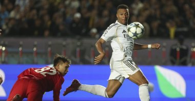 Real Madrid&#039;s Kylian Mbappe scores the 0-2 goal against goalkeeper Sherhan Kalmurza (L) of Kairat Almaty during the UEFA Champions League match, Almaty, Kazakhstan, Sept. 30, 2025. (EPA Photo)