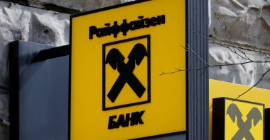 A signboard with the Raiffeisen Bank logo is on display outside a branch, Moscow, Russia, on April 18, 2025. (Reuters Photo)