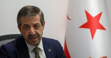 Turkish Republic of Northern Cyprus (TRNC) Foreign Minister Tahsin Ertuğruloğlu speaks to reporters, TRNC, Oct. 10, 2021. (AA File Photo)