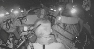 A screengrab from a live video footage shows crew members sitting aboard the Gaza-bound Aurora vessel, part of the Global Sumud Flotilla, Oct. 1, 2025. (Reuters Photo)