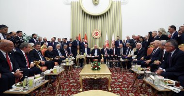 President Erdoğan and leaders of political parties meet on the sidelines of the Turkish Parliament reception in Ankara, Oct. 1, 2025. (AA Photo)