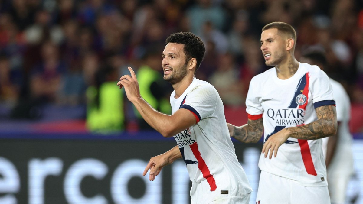 Saint-Germain&#039;s Gonçalo Ramos (L) celebrates scoring their second goal during the UEFA Champions League league phase day 2 football match against Barcelona at the Estadi Olimpic Lluis Companys, Barcelona, Oct. 1, 2025. (AFP Photo)