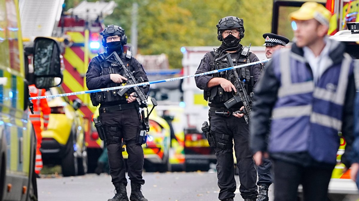 Armed police officers at the scene of a stabbing incident at Heaton Park Hebrew Congregation synagogue, in Crumpsall, Manchester, U.K., Oct. 2, 2025. (AP Photo)