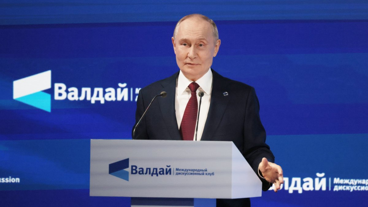 Russian President Vladimir Putin delivers a speech during a plenary session of the 22nd annual meeting of the Valdai Discussion Club in Sochi, Krasnodar region, Russia, Oct. 2, 2025. (EPA via Kremlin)