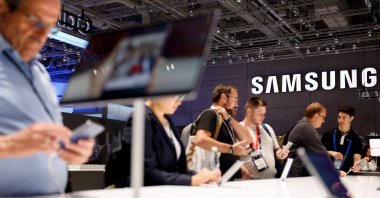 People visit the stand of South Korean electronics manufacturer Samsung at the IFA international trade show, Berlin, Germany, Sept. 5, 2025. (AFP Photo)