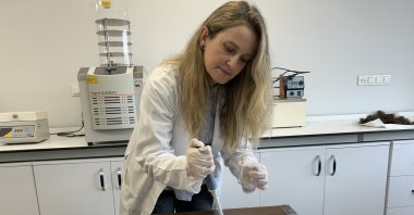Dr. Rumeysa Tutar works on an injectable tissue adhesive in a laboratory, Istanbul, Türkiye, Sept. 26, 2025. (AA Photo)