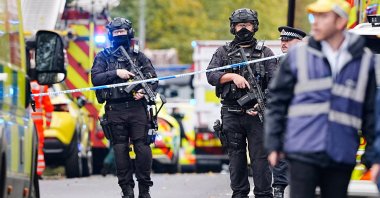 Armed police officers at the scene of a stabbing incident at Heaton Park Hebrew Congregation synagogue, in Crumpsall, Manchester, U.K., Oct. 2, 2025. (AP Photo)