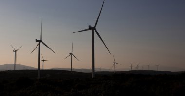 A view of a windmill farm in the Seferihisar district, Izmir, western Türkiye. (Shutterstock Photo)