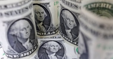 U.S. dollar banknotes are seen in this illustration taken on July 17, 2022. (Reuters Photo)