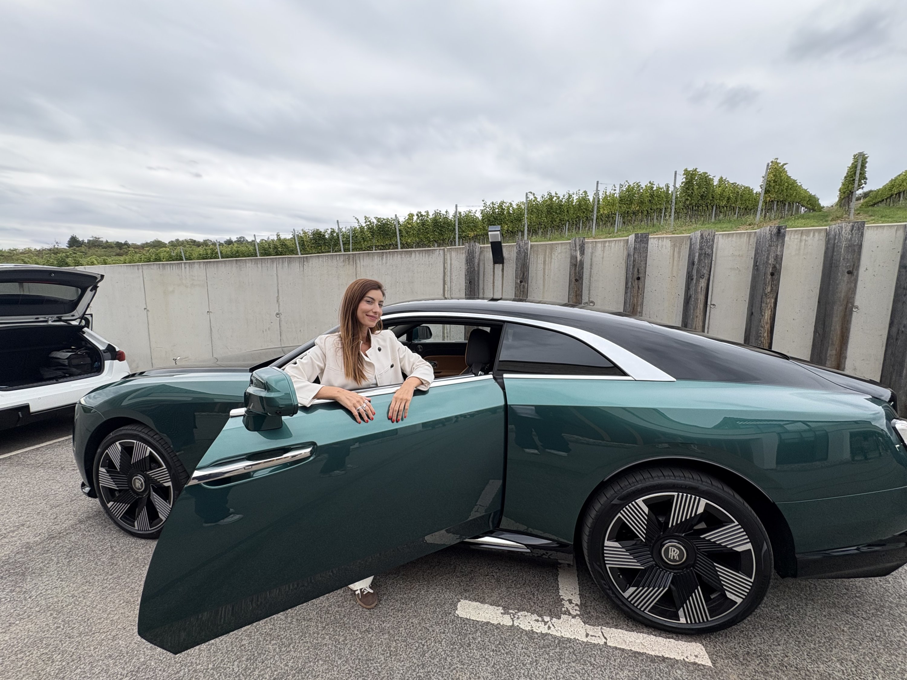 Funda Karayel poses near the Rolls-Royce Spectre, the brand’s first fully electric car, Budapest, Hungary, September 2025. (Photo by Funda Karayel)