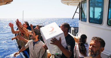 The Turkish Red Crescent provides food and medicine to the Global Sumud Flotilla en route to deliver humanitarian aid to Gaza, with Turkish aid reaching the flotilla’s vessels sailing in the Mediterranean between Crete, Cyprus and Egypt, Sept. 29, 2025. (AA Photo)