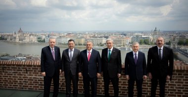 Leaders of the Organization of Turkic States (OTS), including President Recep Tayyip Erdoğan, pose for a photo during a summit, with the Danube River in the background, Budapest, Hungary, May 21, 2025. (AA Photo)