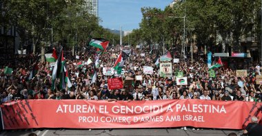 Participants hold a banner reading &#039;Stop genocide in Palestine/stop weapons trade with Israel&#039; during a demonstration in solidarity with Palestinians in Barcelona, Spain, Oct. 4, 2025. (AFP Photo)