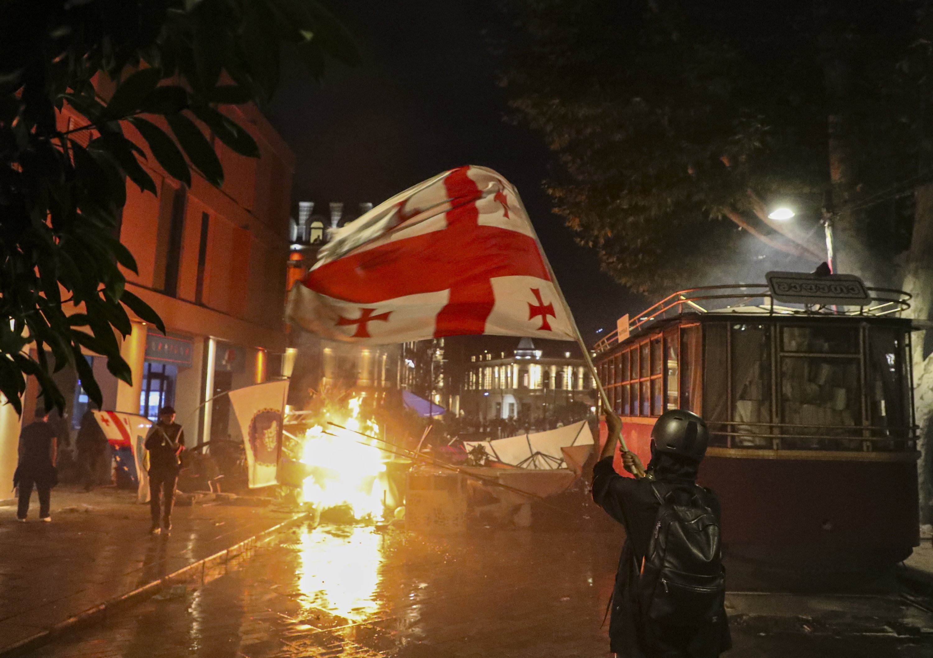 Georgia PM vows reprisals as opposition protests moot election