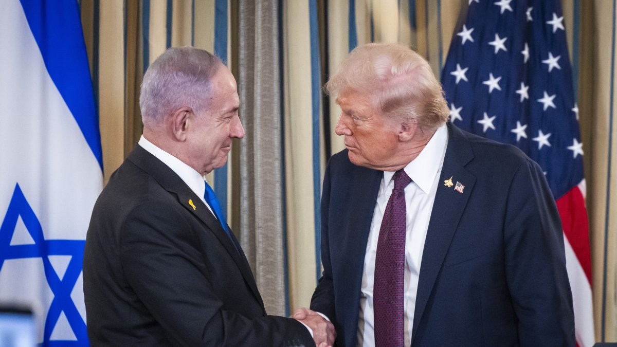U.S. President Donald Trump shakes hands with Israeli Prime Minister Benjamin Netanyahu during a joint news conference at the White House, Washington, U.S., Feb. 4, 2025. (İHA Photo)