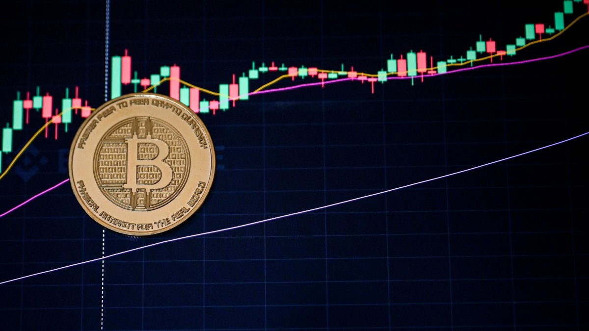 Bitcoin strikes new record high, tops $125,000