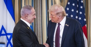U.S. President Donald Trump shakes hands with Israeli Prime Minister Benjamin Netanyahu during a joint news conference at the White House, Washington, U.S., Feb. 4, 2025. (İHA Photo)