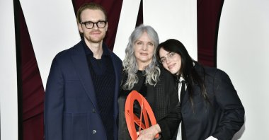 From left to right, Finneas, Maggie Baird and Billie Eilish attend the Glamour Women of the Year Awards in New York, U.S., Oct. 8, 2024. (AP Photo)