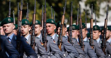 Honor guard soldiers walk with rifles prior to the arrival of Swiss Federal Councilor Martin Pfister (not in picture) at the defense ministry in Berlin, Germany, Oct. 2, 2025. (EPA Photo)