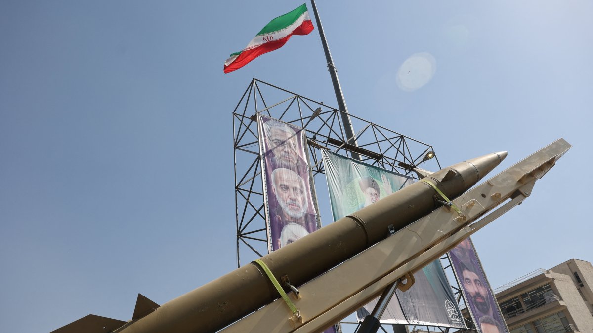 An Iranian missile system is displayed next to a banner with a picture of Iran&#039;s Supreme Leader Ayatollah Ali Khamenei during Iranian Defense Week, in Tehran, Iran, Sept. 25, 2025. (Reuters Photo)