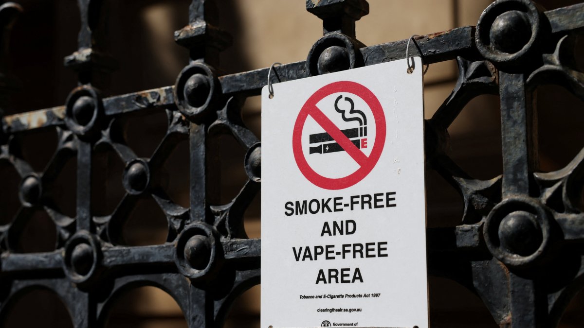 A government notice outlining smoking and vaping restrictions is displayed outside a building in Adelaide, Australia, Sept. 18, 2025. (Reuters Photo)
