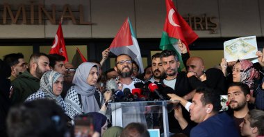 Turkish activists speak to the press after their arrival at the airport, Istanbul, Türkiye, Oct. 4, 2025. (Reuters Photo)