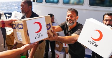 The Turkish Red Crescent (Kızılay) provides food and medicine to the Global Sumud Flotilla en route to deliver humanitarian aid to Gaza, with Turkish aid reaching the flotilla’s vessels in the Mediterranean between Crete and Egypt, Sept. 29, 2025. (AA Photo)