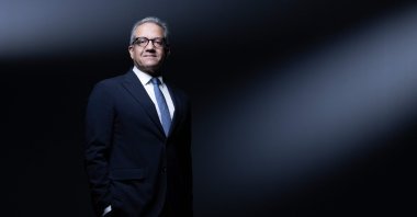 Khaled el-Anani, former Minister of Tourism and Antiquities of Egypt and candidate to become the head of UNESCO poses during a photo session in Paris, Oct. 1, 2025. (AFP Photo)