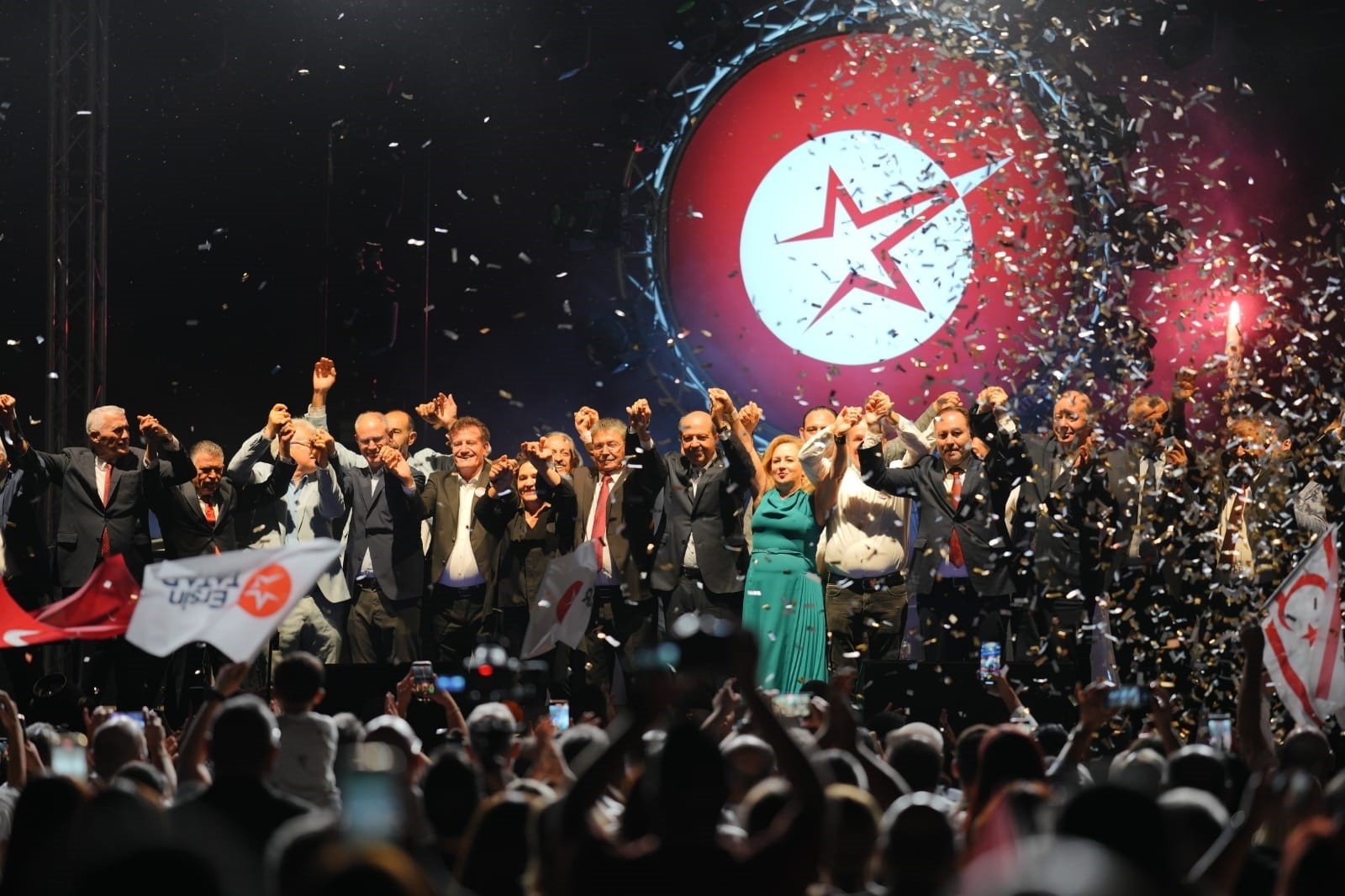 TRNC President Ersin Tatar (C) poses with people during a campaign rally, Lefkoşa (Nicosia), TRNC, Oct. 5, 2025. (İHA Photo)
