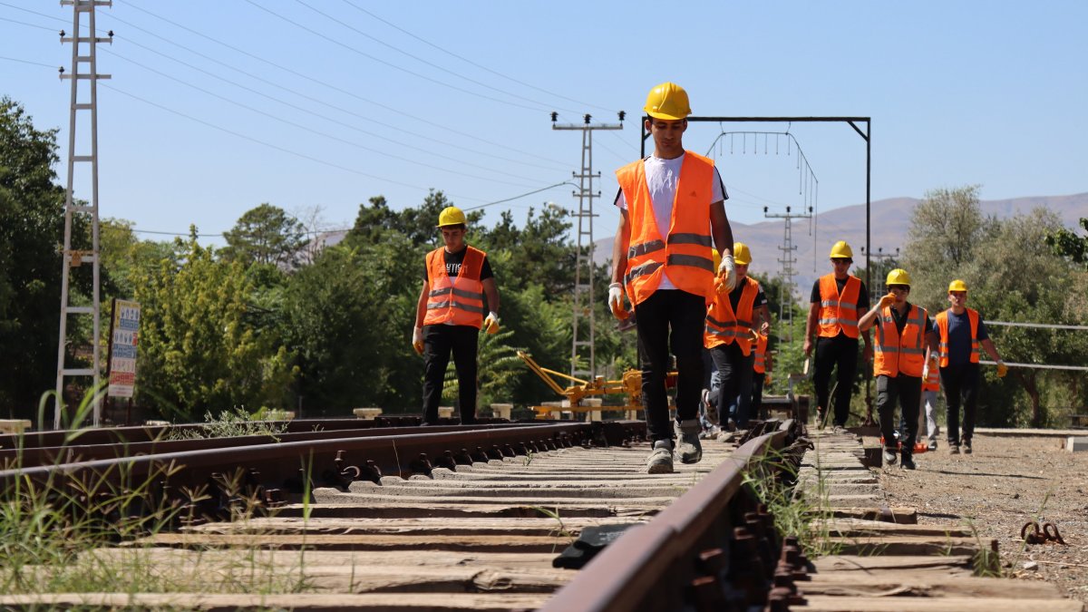 High school students are seen inspecting rails close to a historic train station, Erzincan, eastern Türkiye, Sept. 22, 2025. (AA Photo)