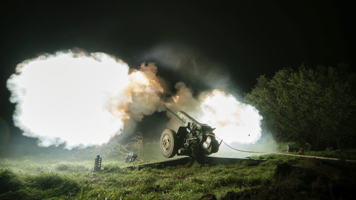Ukrainian servicemen fire from a 122mm artillery cannon towards Russian positions in Kherson region, Ukraine, Sunday Oct. 27, 2024. (AP Photo/Marko Ivkov)