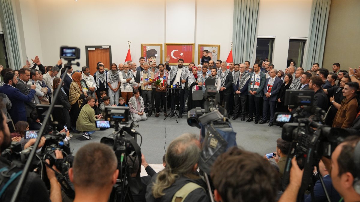 Sumud Flotilla activists speak to reporters at Istanbul Airport, Oct. 7, 2025. (AA Photo)