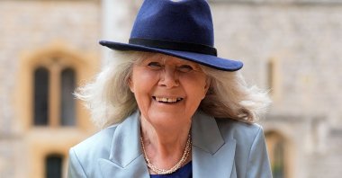 British author Jilly Cooper smiles after being appointed a Dame Commander of the Order of the British Empire (DBE) following an investiture ceremony at Windsor Castle, southern England, May 14, 2024. (AFP Photo)