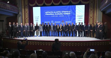 Transport and Infrastructure Minister Abdulkadir Uraloğlu (C) attends the ceremony for the signing of the financing agreement for the Antalya-Alanya Highway project, Ankara, Türkiye, Oct. 7, 2025. (AA Photo)