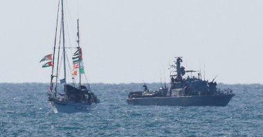 An Israeli navy vessel escorts a vessel from the Global Sumud Flotilla to Ashdod Port, after unlawfully intercepting the vessels of the Flotilla aiming to reach Gaza and break Israel&#039;s naval blockade, in southern Israel, Oct. 2, 2025. (Reuters Photo)